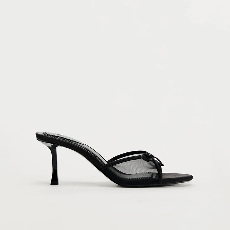 Elara's Stunning Black Heels