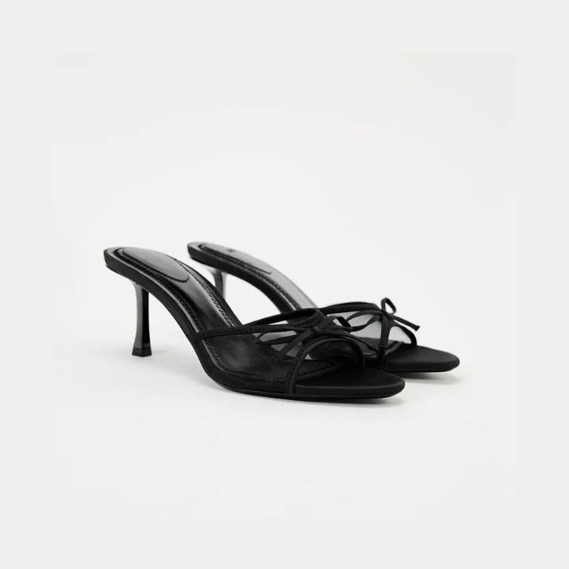 Elara's Stunning Black Heels