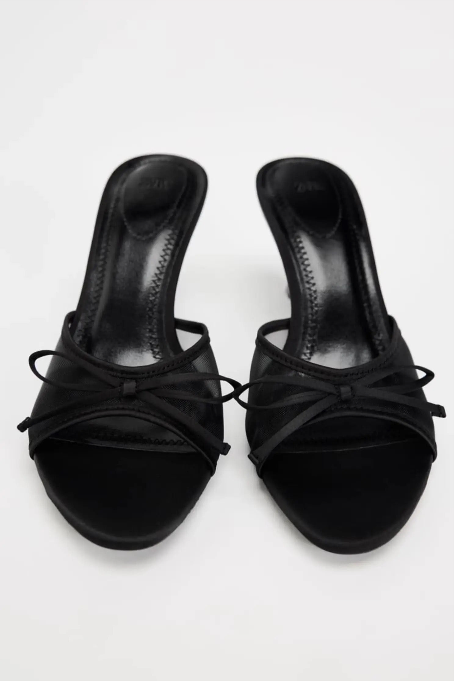 Elara's Stunning Black Heels